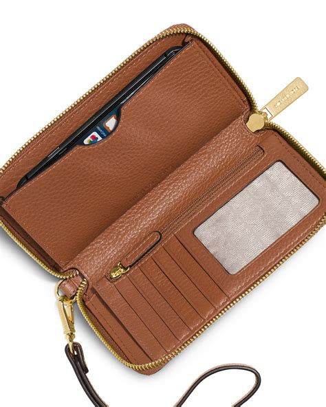 michael kors mobile phone wallet|michael kors multifunction wallet.